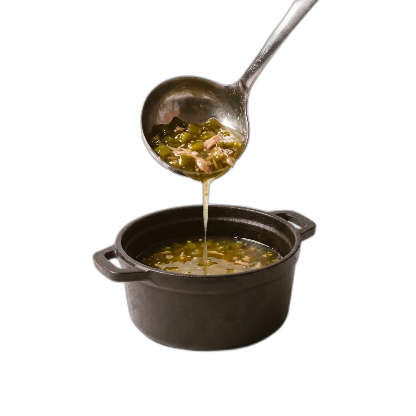 Housemade Hatch green chili mid-pour from a ladle